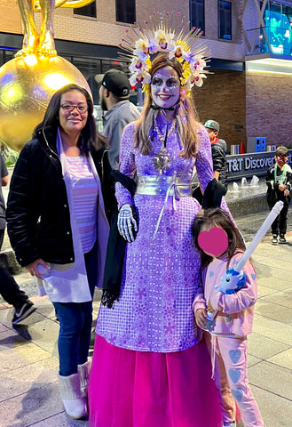 Picture at Dia de los Muertos parade downtown Dallas with a catrina