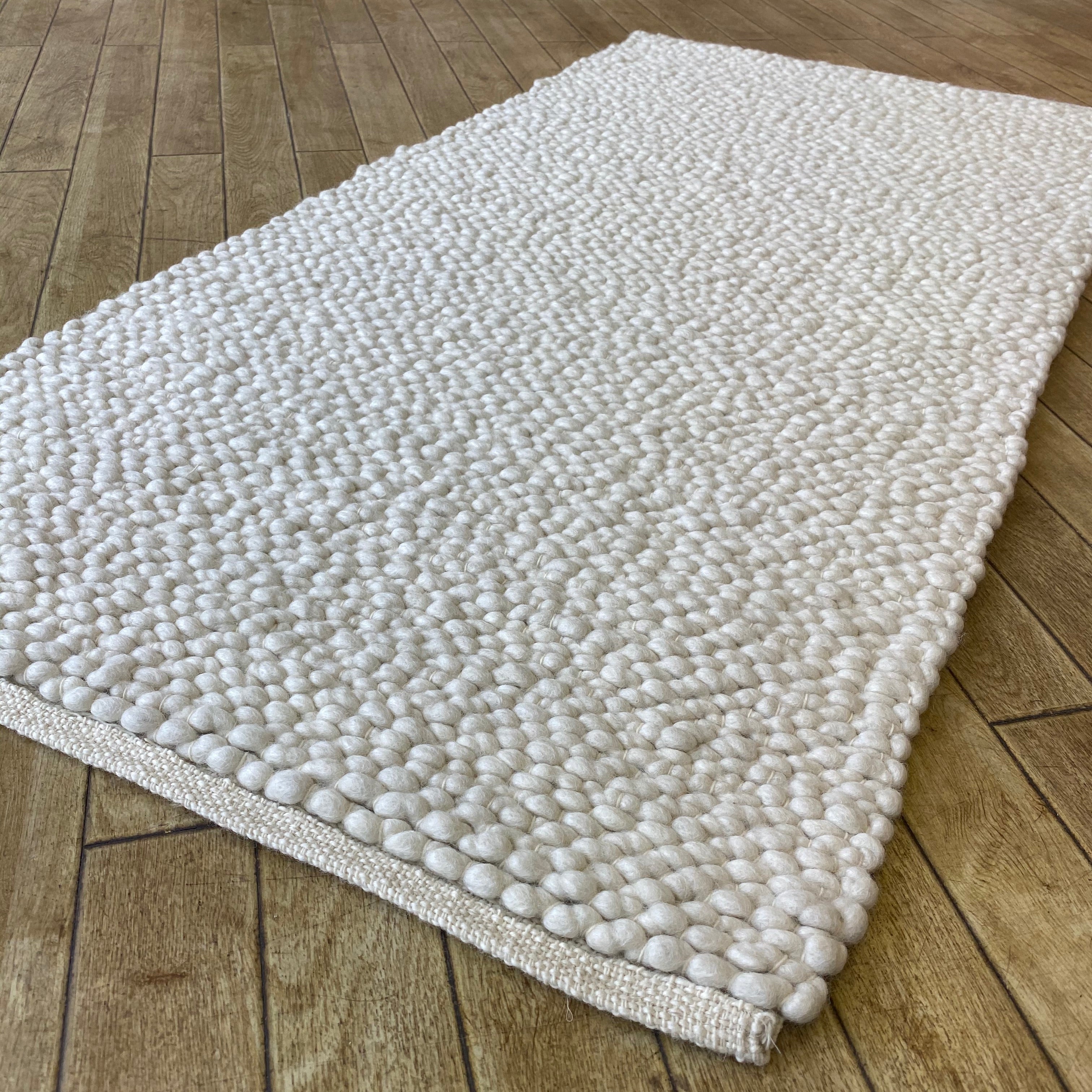 An image of Voras Hand Woven Wool Rug Thick Loom - Natural White 160x230cm