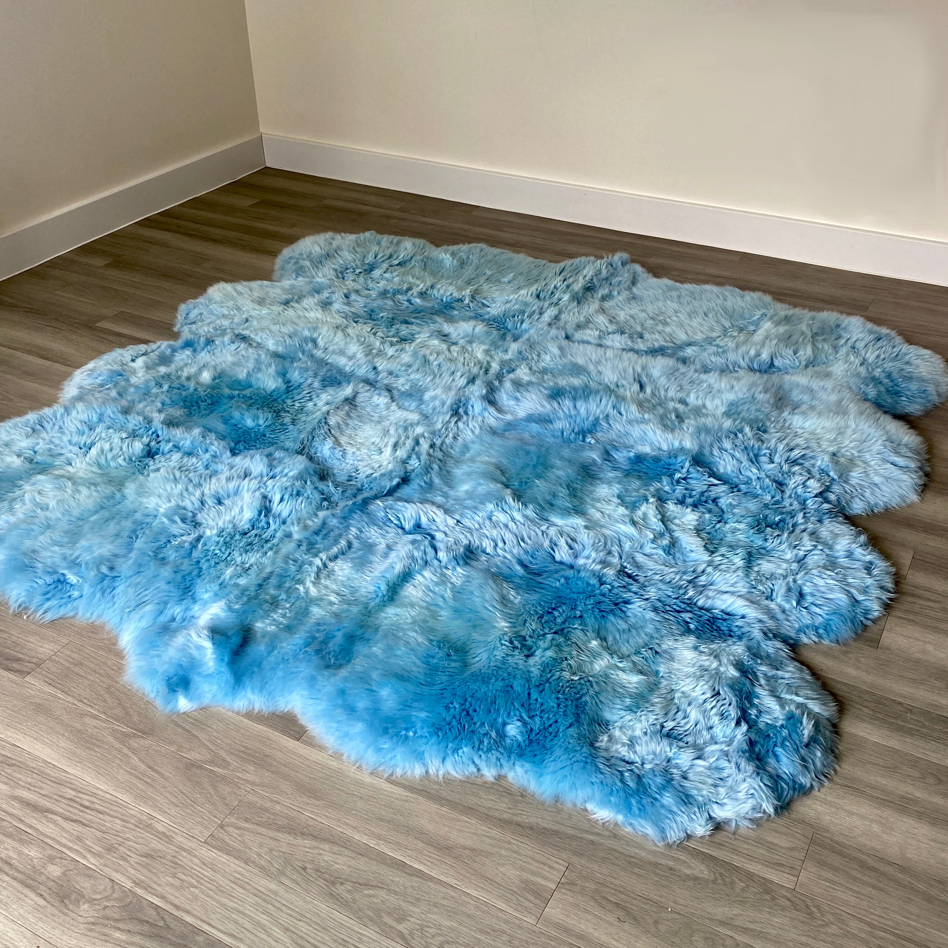 An image of Sky Blue Sheepskin Rug (Octo)