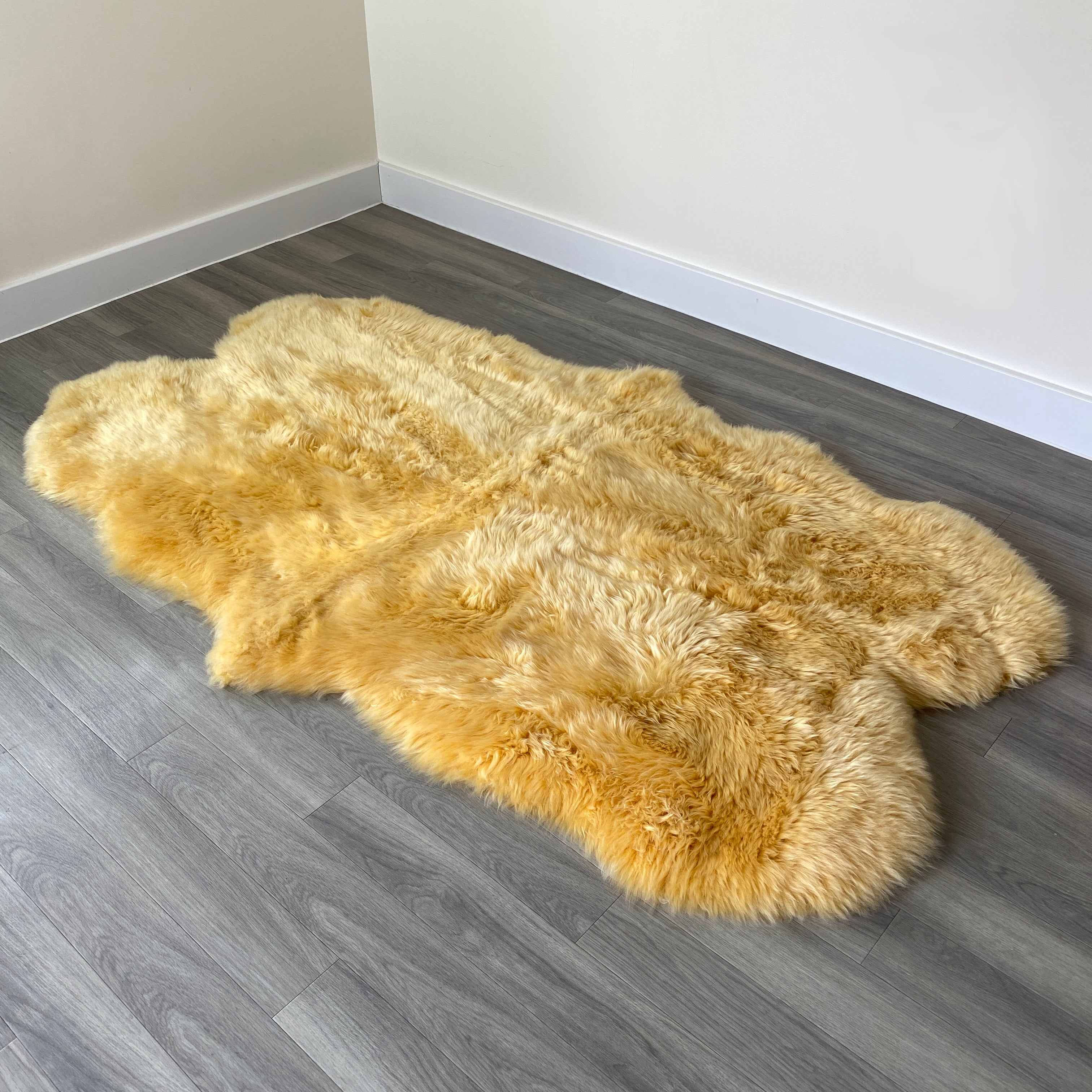 An image of Mustard Sheepskin Rug (Quad)