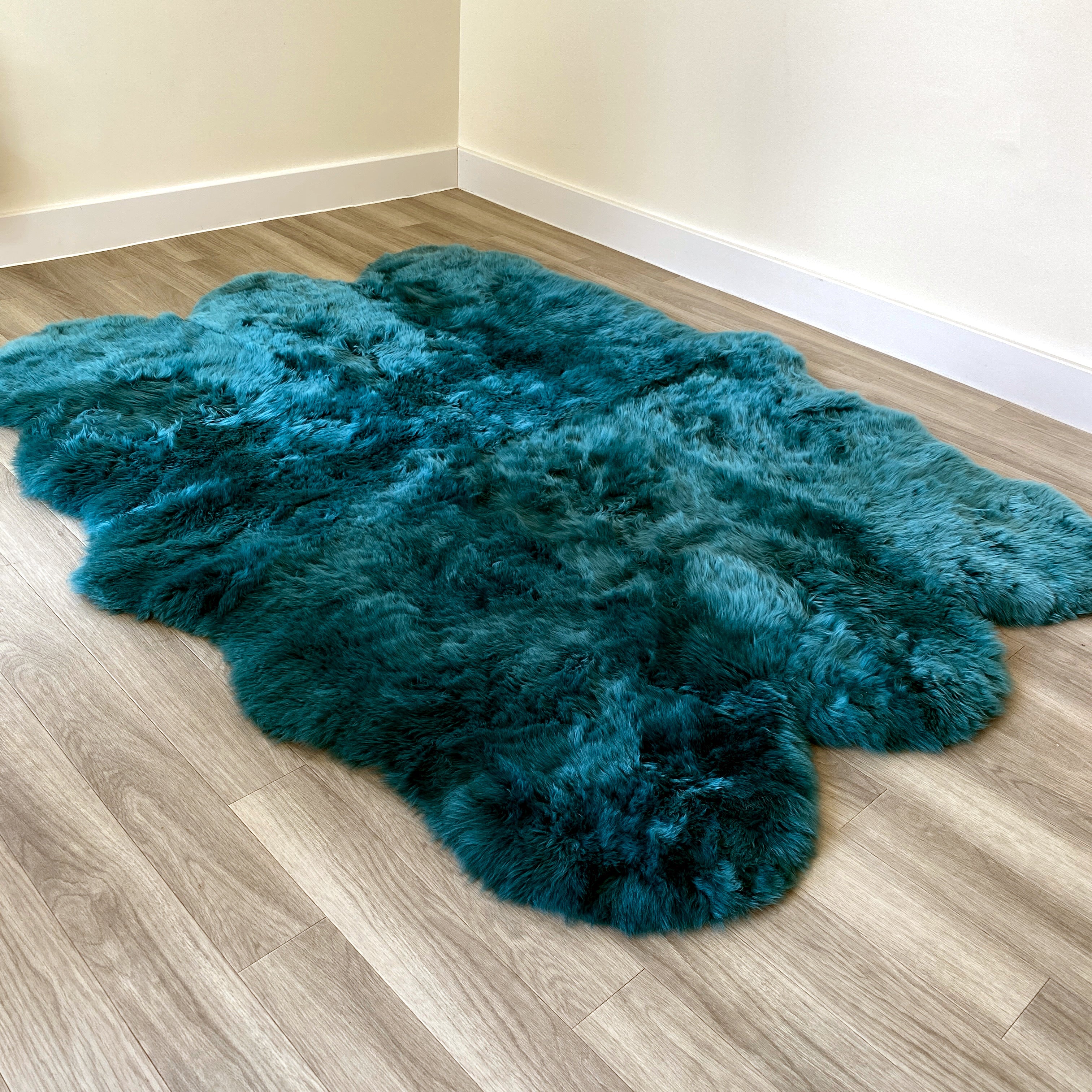 An image of Teal Sheepskin Rug (Sexto)