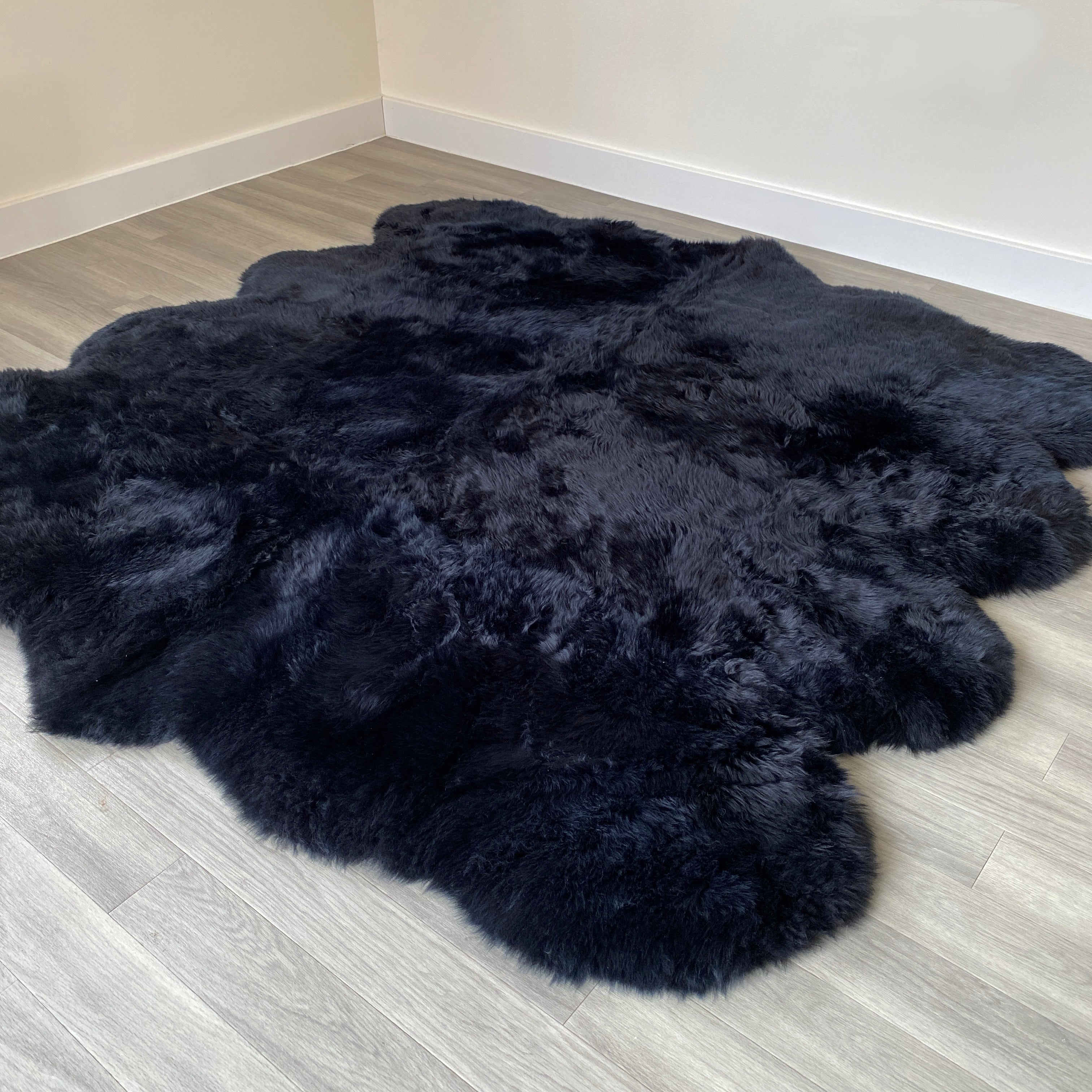 An image of Black Sheepskin Rug (Octo)