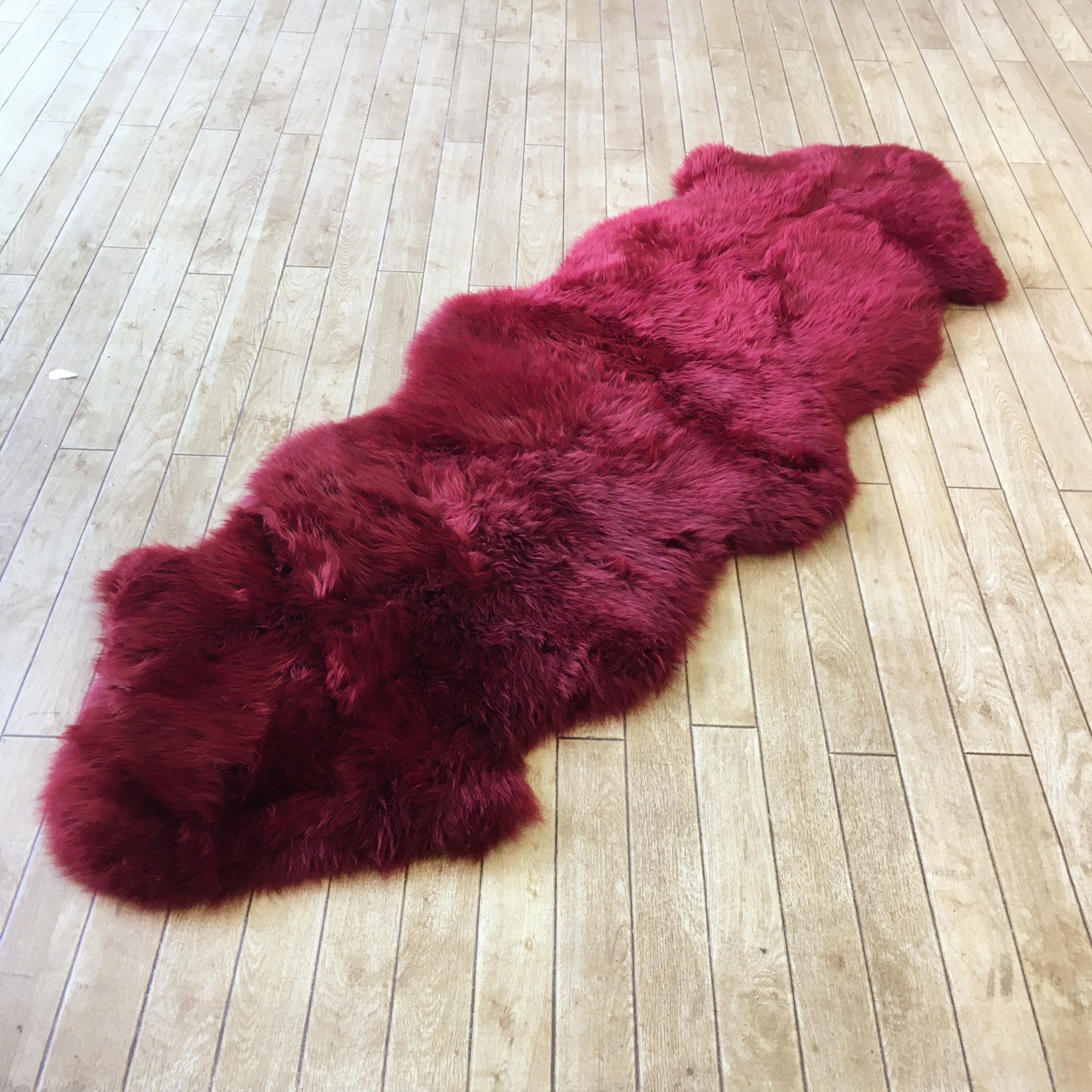 An image of Wine Red Sheepskin Rug (Double)