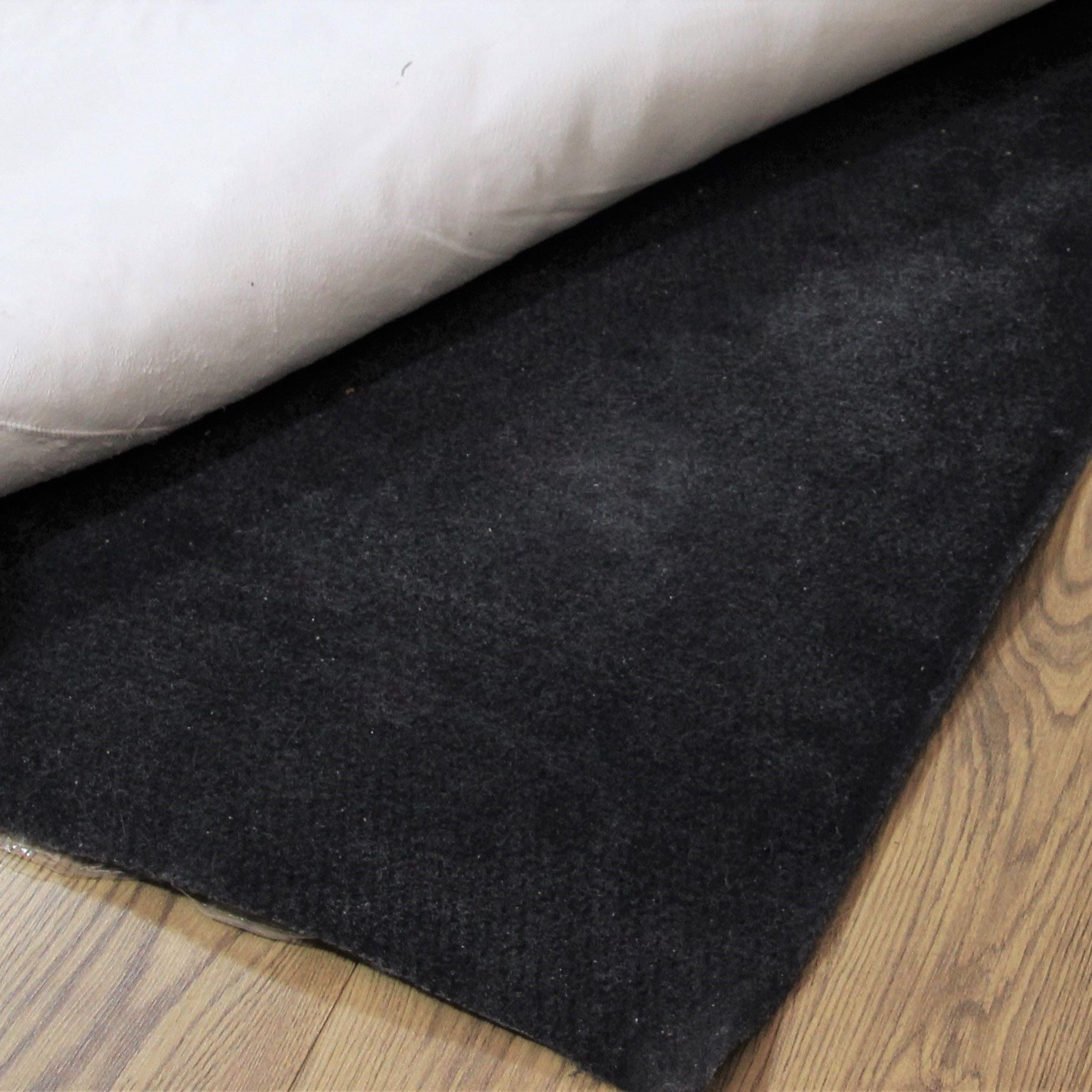 An image of Non-Slip Rug Underlay for Carpets & Handfloors Quad Sheepskin