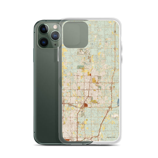 Custom Edmond Oklahoma Map Phone Case in Woodblock on Table with Laptop and Plant