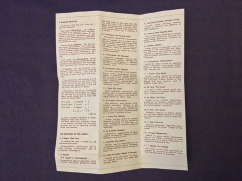 Back of white explanation sheet for Tobacco Tarot