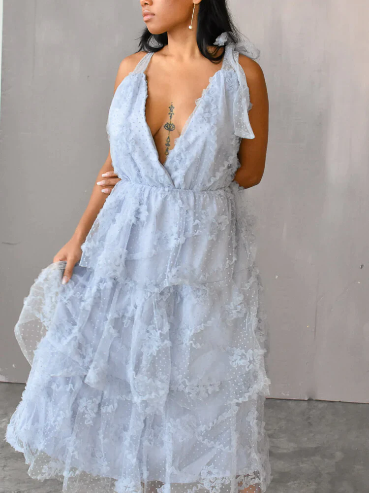 model wearing the Avi Blue Textured Midi Dress