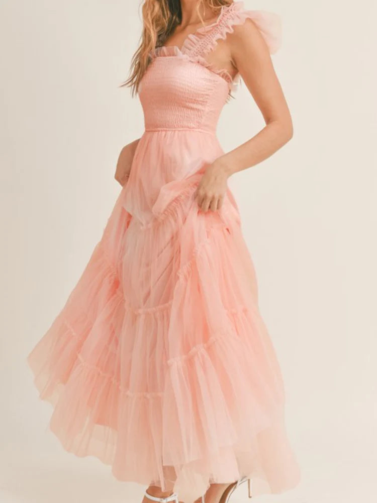 model wearing a pink Easter dress