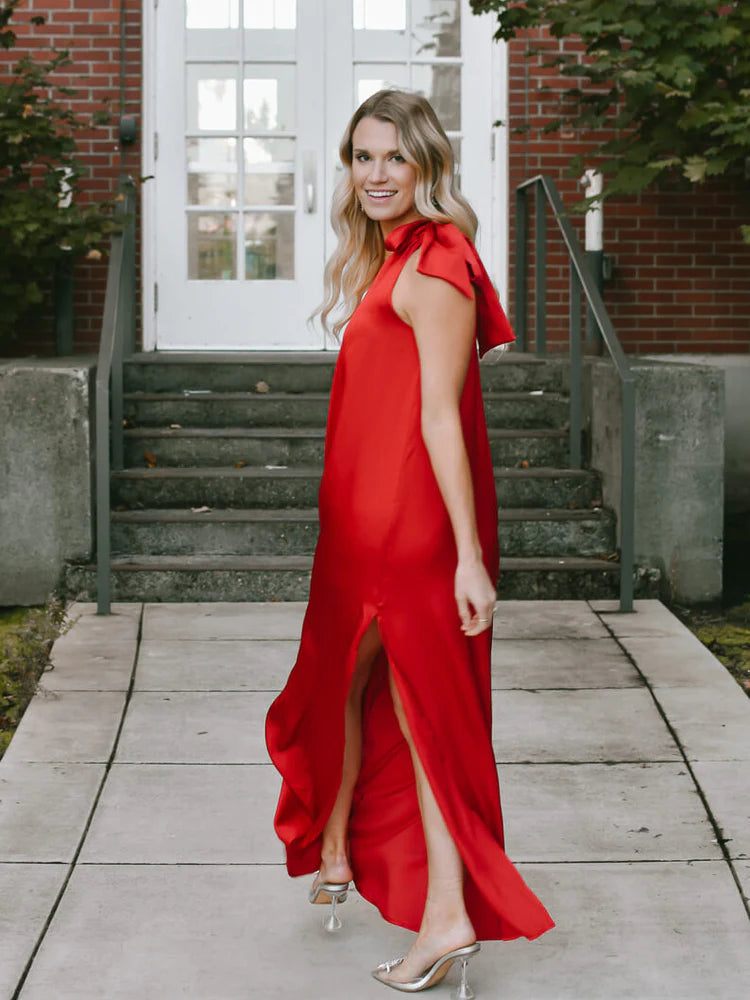 model wearing a red prom dress style