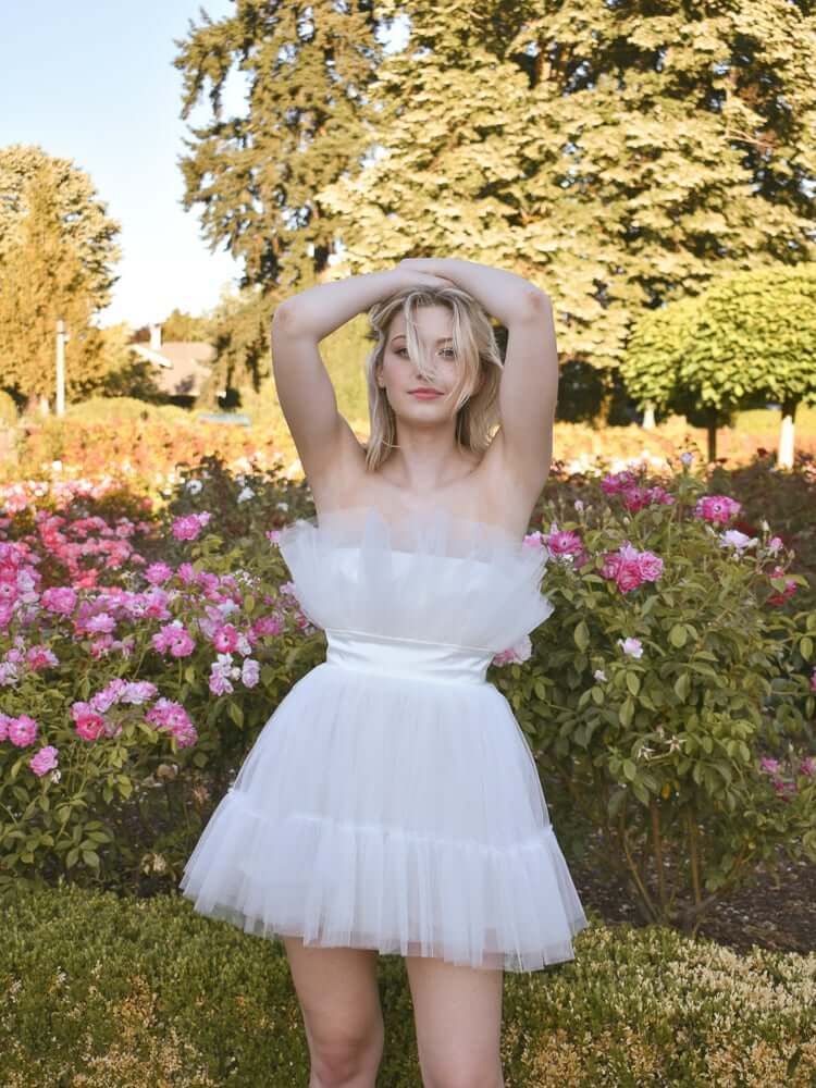model wearing white tulle dress