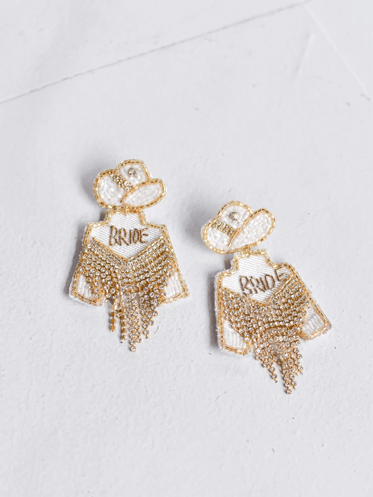 A pair of rhinestone cowgirl statement earrings