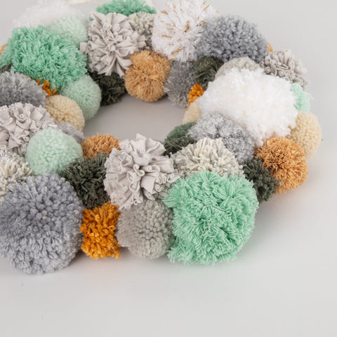 https://creativefinds.com.au/collections/christmas-is-coming/products/pom-pom-christmas-wreath