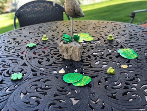 table in backyard with st patricks day decorations 