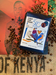 love, bird kenyan coffee by Three Keys, next to liner notes from Charlie Parker album, on top of burlap sack of Kenyan coffee