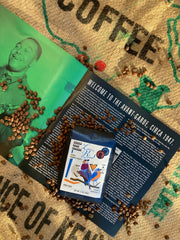 liner notes, charlie parker, love bird kenyan coffee on top of a burlap sack of coffee. Page says "Welcome to the Avant Garde circa 1947"