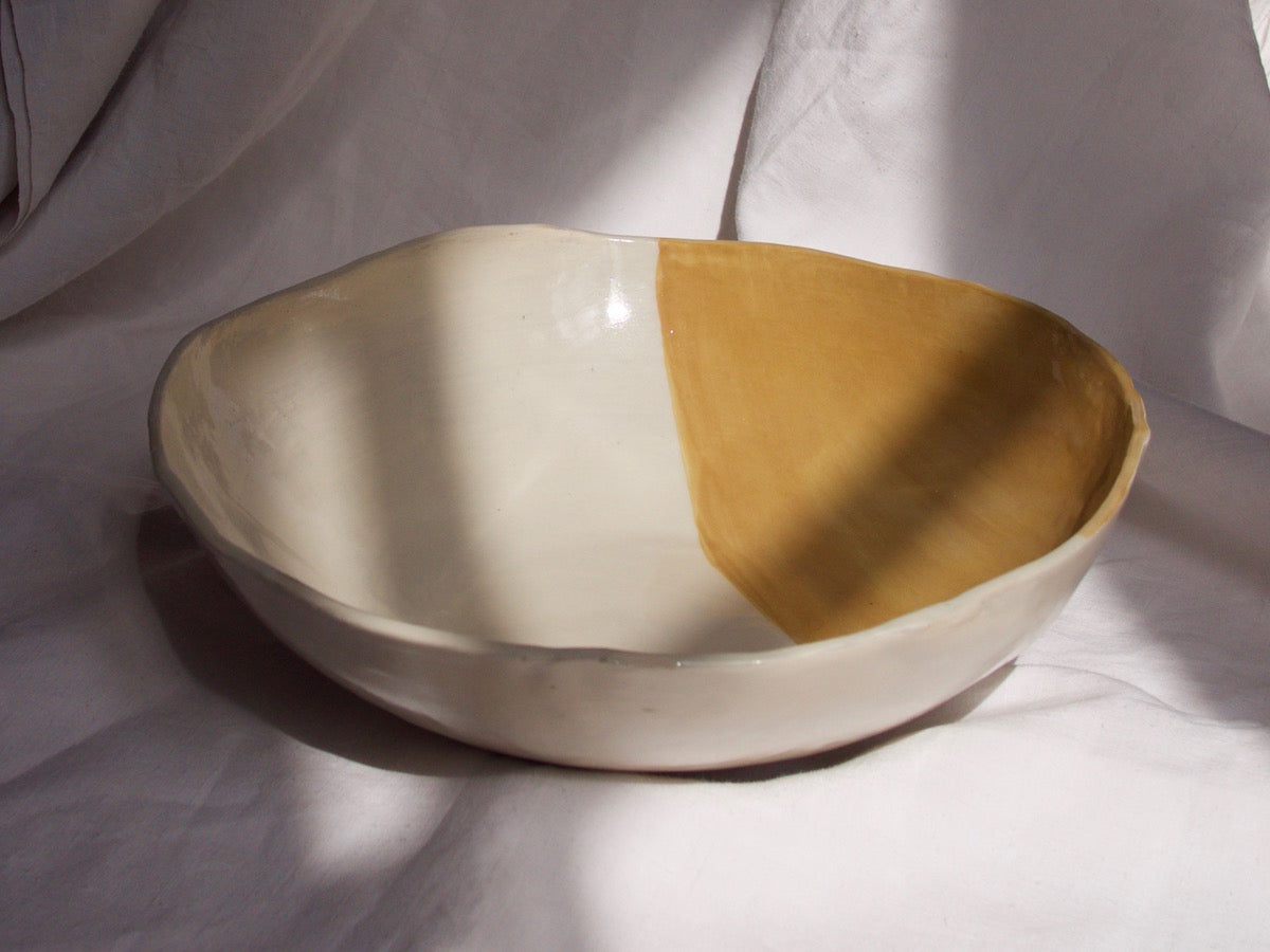 yellow ceramic fruit bowl