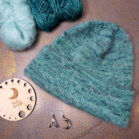 Oslo hat knitted by Woollen Wytch using hand dyed yarn 