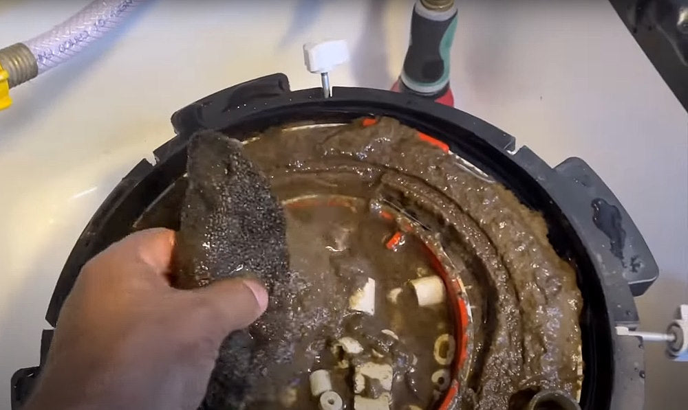 cleaning a canister filter