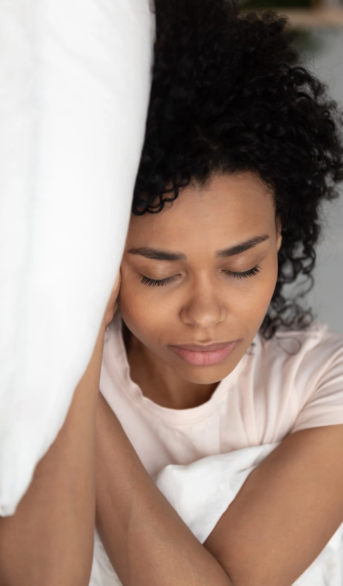 Woman asleep in bed