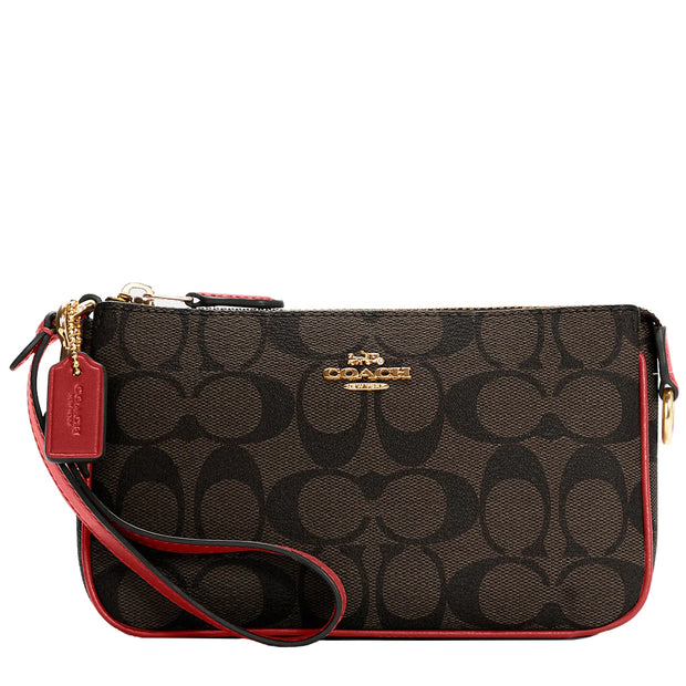 COACH Waverly Signature Small Wristlet in Pink