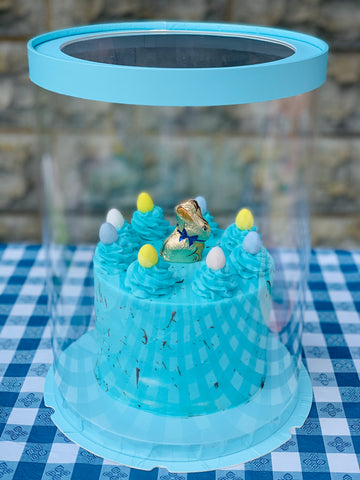 blue bunny cake in clear round tall box