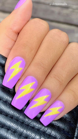 purple acrylic nails with lightening bolts