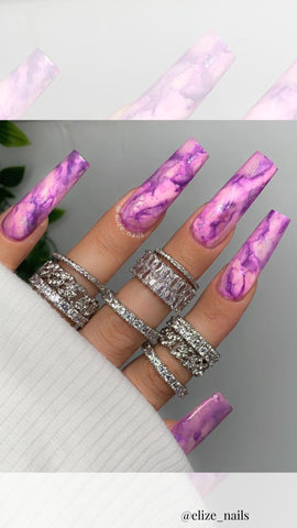 purple acrylic nails with pink marble