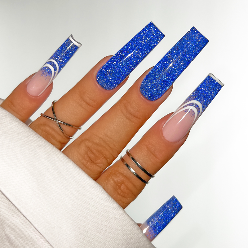 royal blue nails with rhinestones