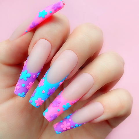 pink and purple colored french tip nails