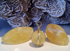 Yellow Danburite Pendant and rocks by Venusrox 