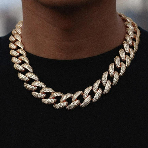 Are you looking for a cutting-edge deviation of the OG Cuban chain? The Curb Cuban chain has a really pronounced look; the links have flatter edges that make the whole piece appear more angular. While Curb links have a more rigid design, it’s also important to note that the links are usually spaced out slightly more than the other major style of Cuban chains (i.e. Prong and Miami Cuban chains). The Curb Cuban chains tend to have a little more movement when they’re worn because of the extra space between each link.
