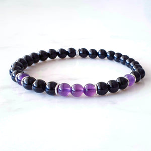 Stretch bracelet, 6mm purple Amethyst and Black Obsidian gemstones, with sterling silver rings as occasional spacers