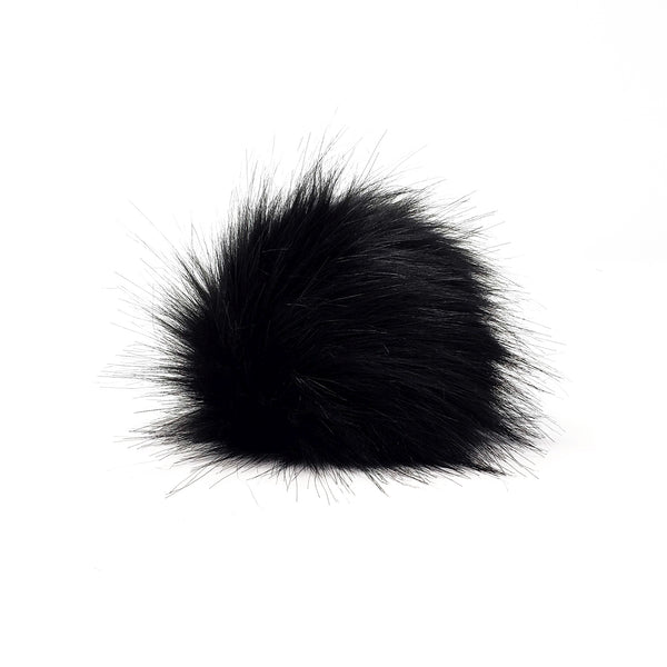 black fur pom pom