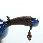Poignée d'une théière chinoise bleue