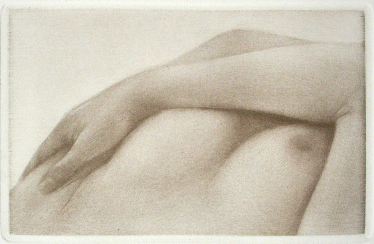 Mikio Watanabe's "En douceur." Monotone image of a woman's chest with her arms folded across her breasts.
