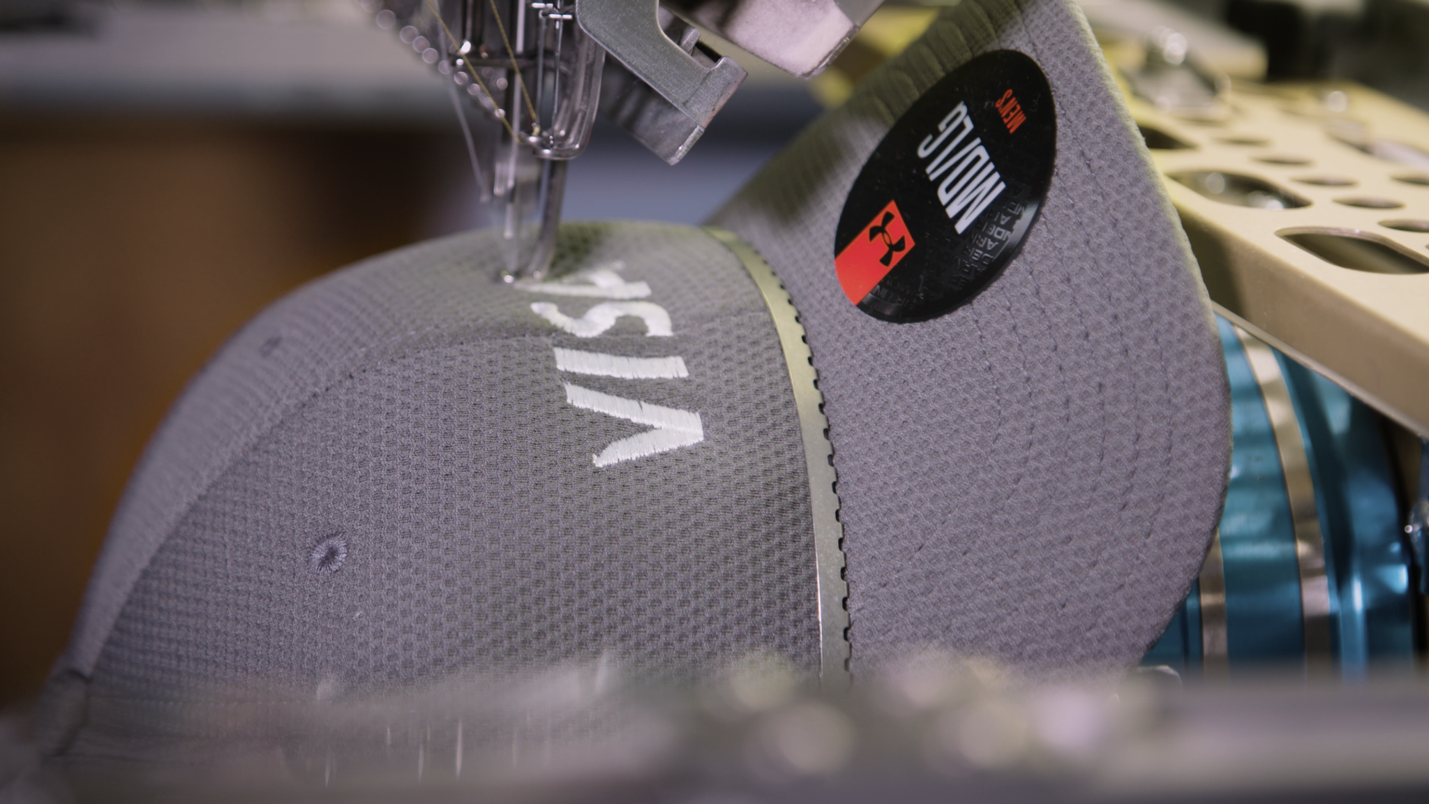 Custom Hat Being Embroidered with a Company Logo