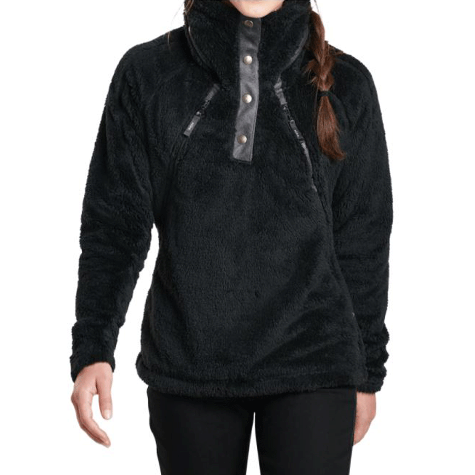 A woman with a single braid down her should is wearing a fuzzy black custom women's corporate KUHL pullover against a white background
