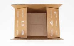 Custom Shipping Box arrives at your door with your custom company merchandise