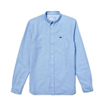 A sky blue custom Lacoste men's dress shirt against a white background