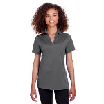 Woman with curly hair standing with a clean-cut gray corporate Spyder polo for women from Merchology