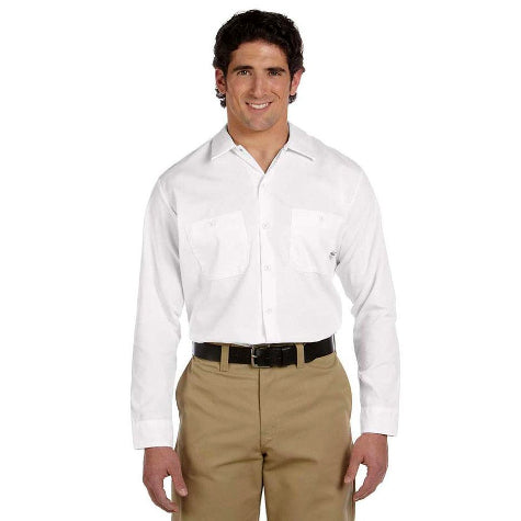 A man in a white custom Dickies work shirt and khakis standing in a room