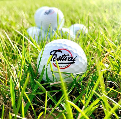 Shop custom logo golf balls for your company spring events with Merchology