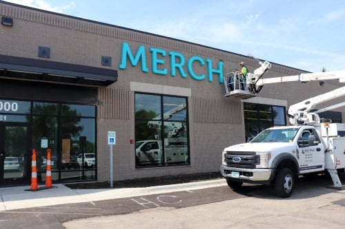 With a new Merchology sign installed, our brand new local MN facility is open