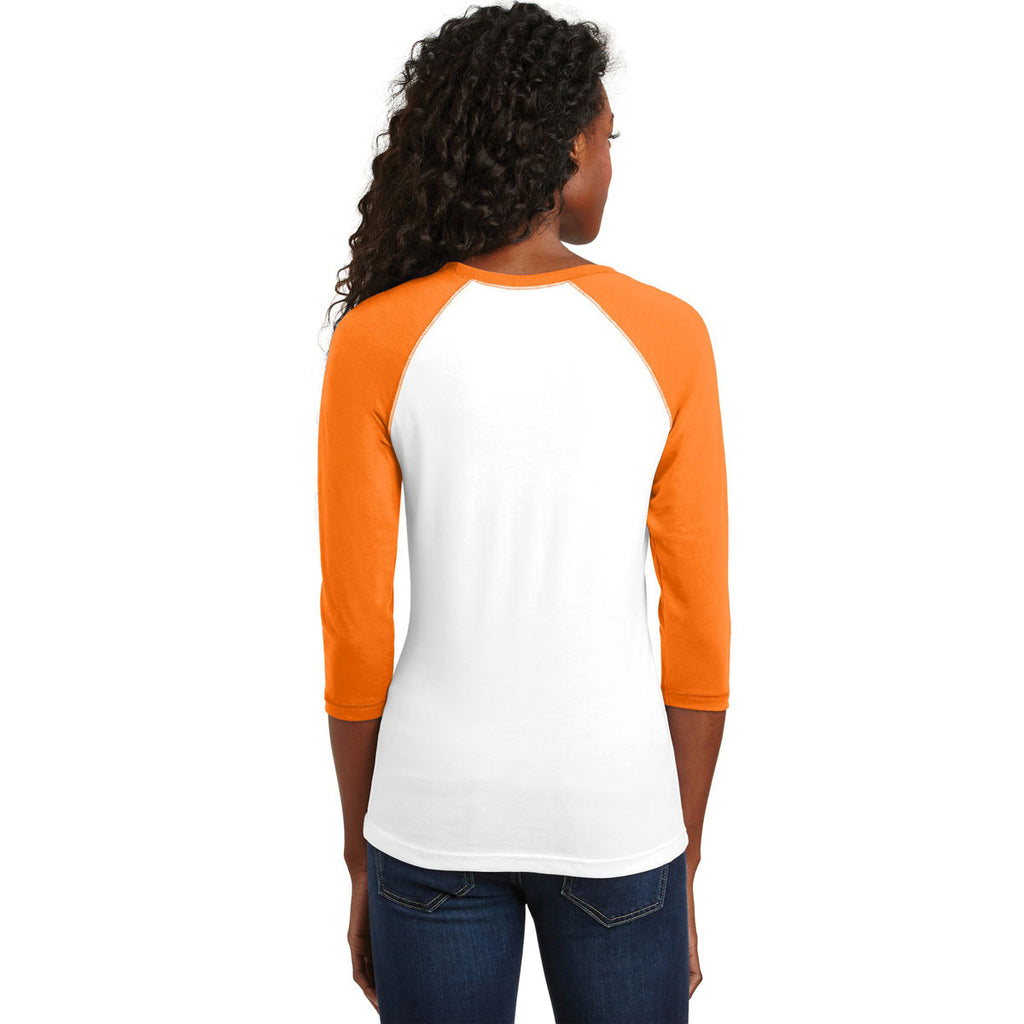 orange and white raglan shirt