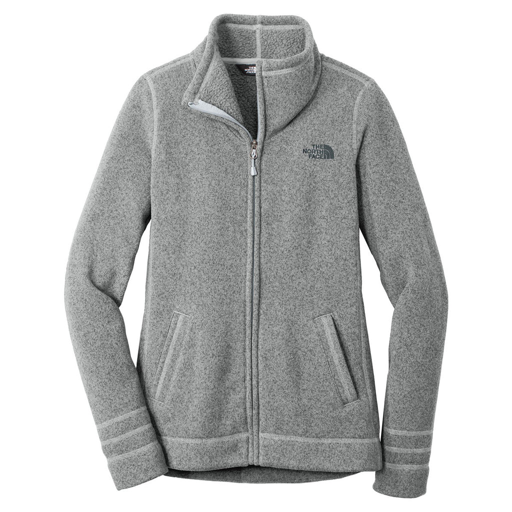 gray fuzzy north face jacket