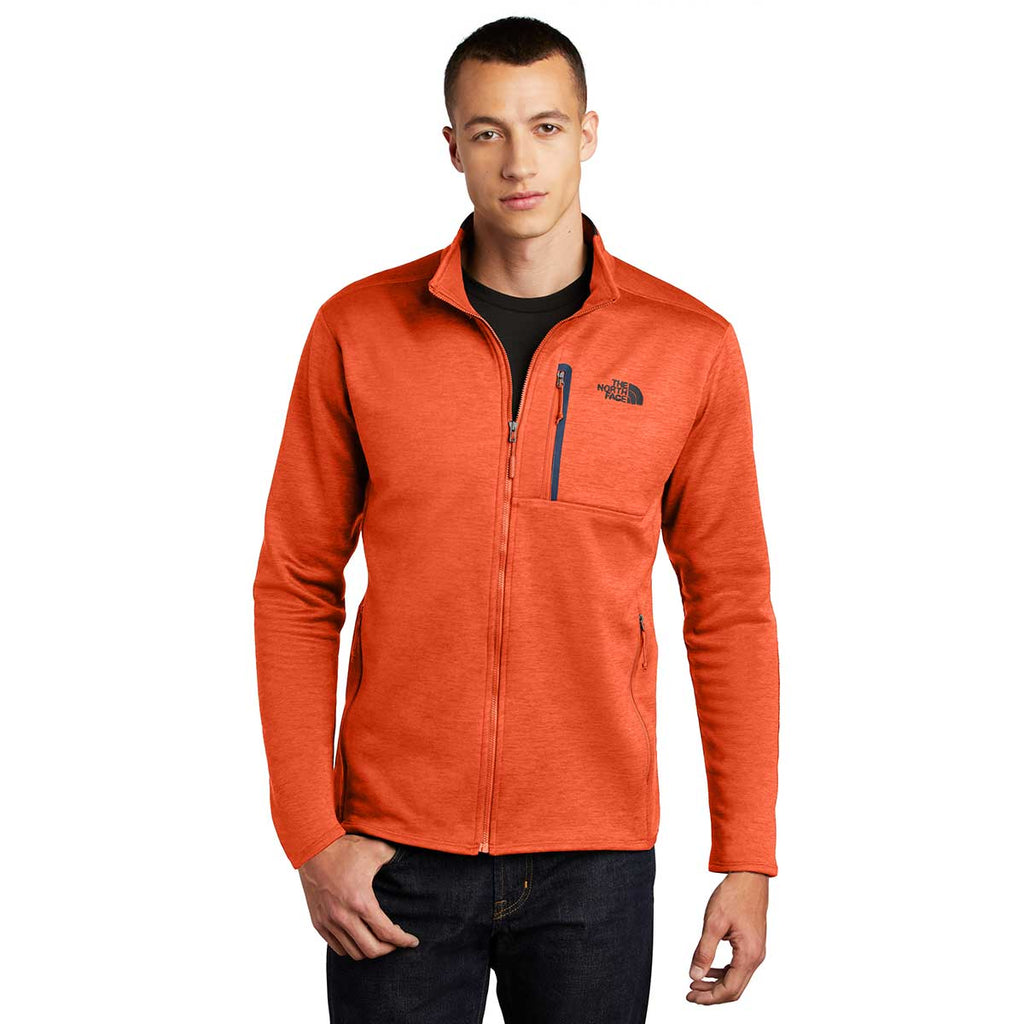 orange north face fleece jacket