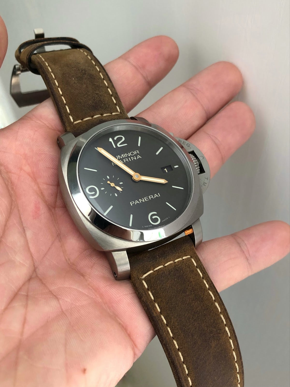 panerai watch held in a hand