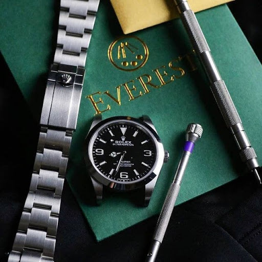 rolex watch disassembled with everest tool kit