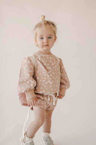 Toddler wearing Jamie Kay Wanderlust Collection Penny Sweat and Ivy Shorties in Daisy