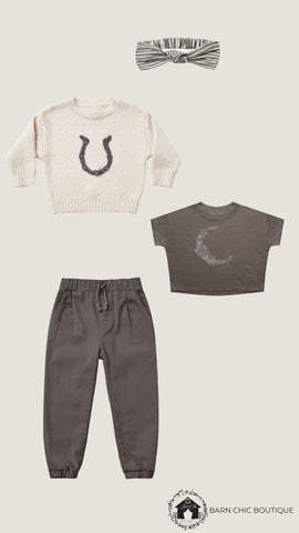 Outfit pairings with product photos from Rylee + Cru Autumn Winter 21 AW 21 fall collection drop 1, featuring the Cassidy sweater in horseshoe paired with the Beau pants in Charcoal and the boxy tee in Flora Luna